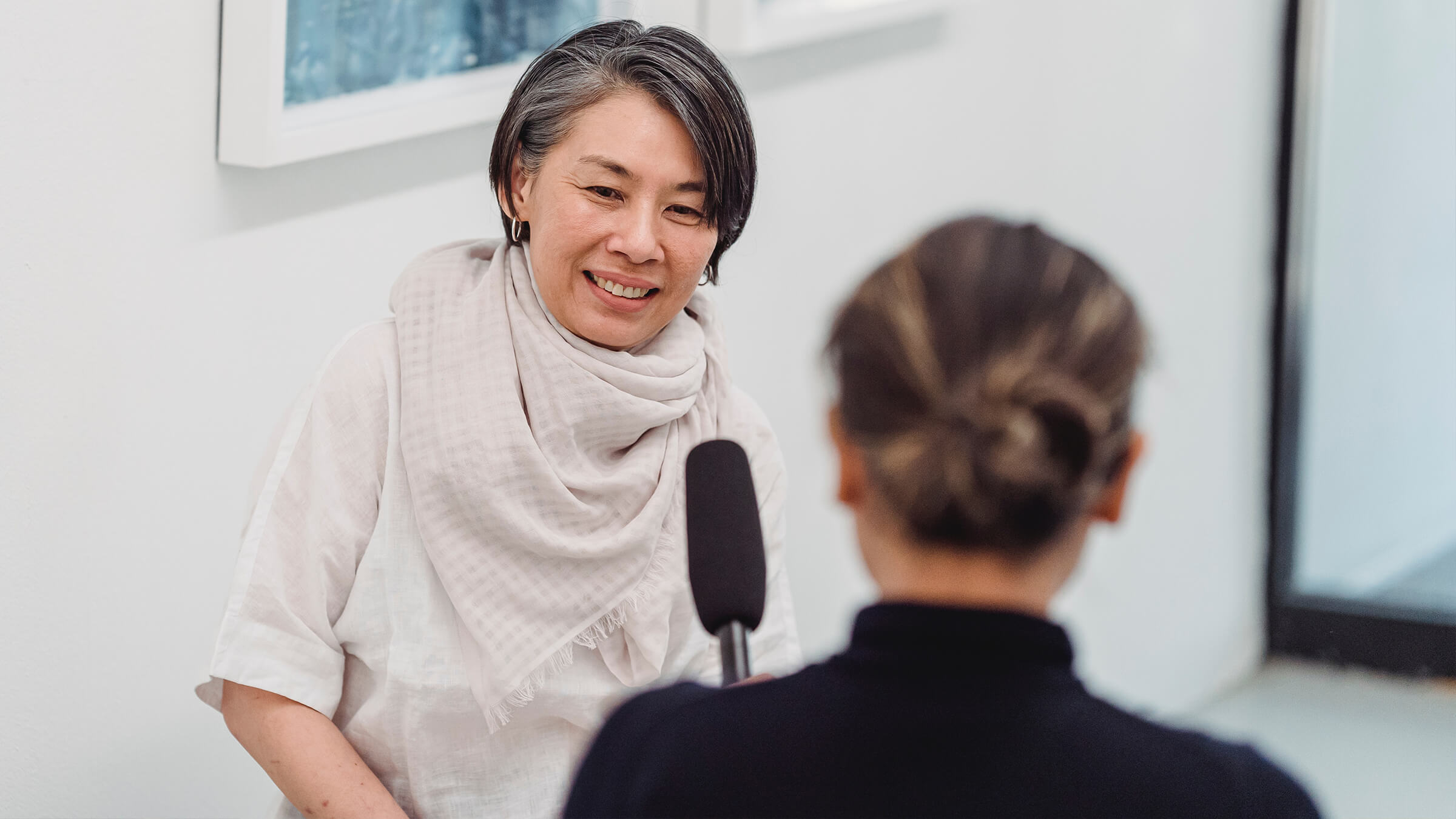 Woman answering questions at an event